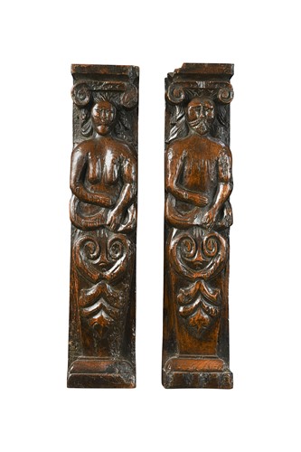 Lot 339 - A pair of carved oak caryatids, 17th century