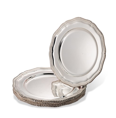 Lot 367 - A set of eight Elizabeth II silver dinner plates
