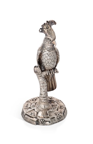Lot 318 - A Victorian silver cockatoo spill vase on perch