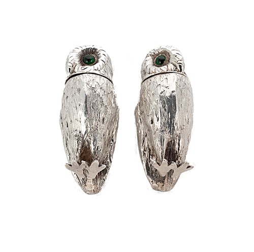 Lot 231 - A pair of George V novelty silver owl pepperettes