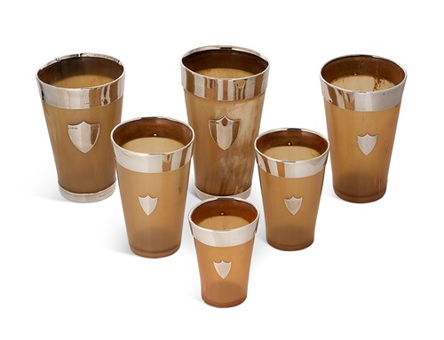 Lot 352 - A group of six George V silver mounted horn beakers
