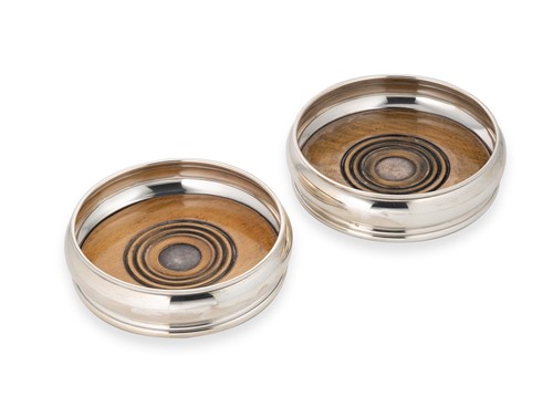 Lot 373 - A pair of Elizabeth II silver wine coasters