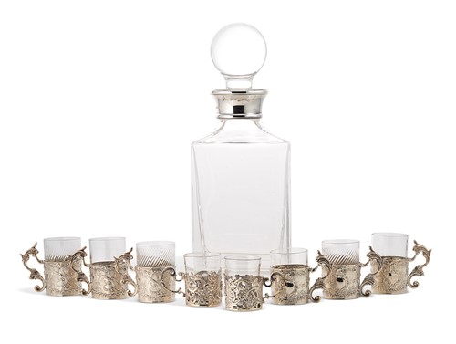 Lot 363 - A collection of eight embossed silver mounted liqueur glasses and a decanter