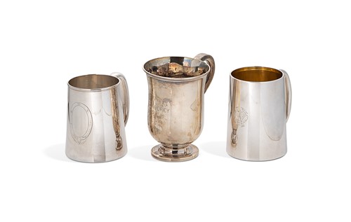 Lot 330 - Three English hallmarked silver mugs or tankards