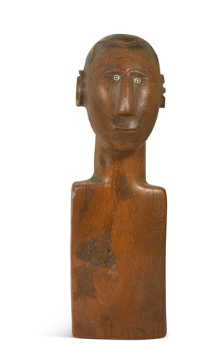 Lot 67 - A Toraja Sulawesi carved wooden tribal bust, 19th century