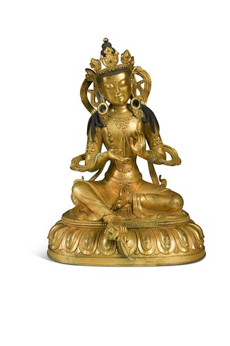 Lot 64 - A gilt bronze seated Tara