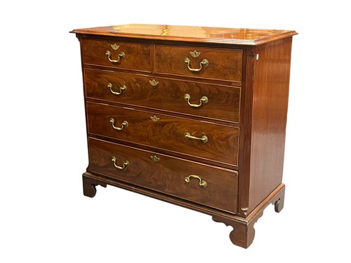 Lot 731 - A George III mahogany chest of drawers, two...