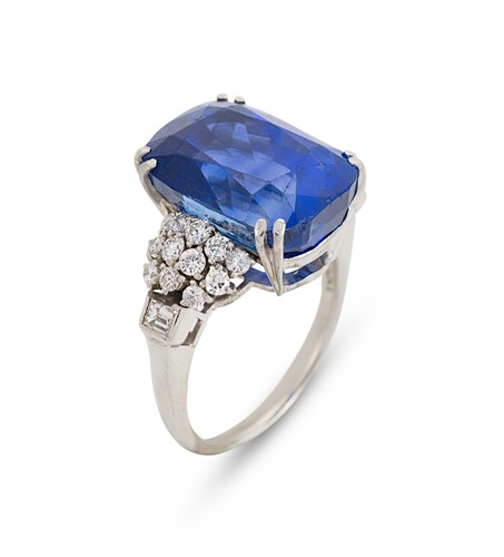 Lot 144 - A Burmese sapphire and diamond ring