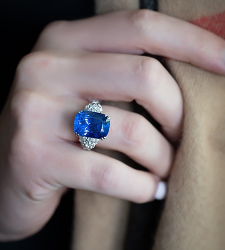 Lot 144 - A Burmese sapphire and diamond ring