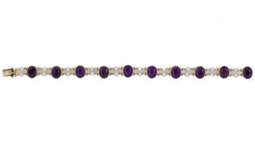 Lot 108 - A late 20th century amethyst and pearl bracelet