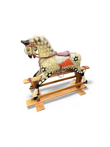 Lot 717 - A painted wood rocking horse, 20th...