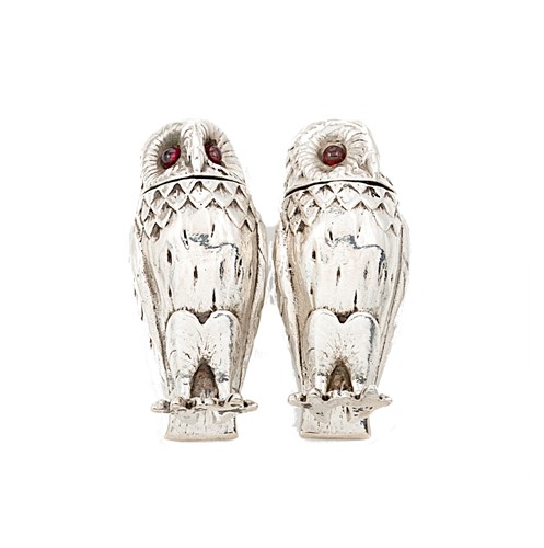 Lot 225 - A pair of Elizabeth II novelty silver owl salt and pepper casters