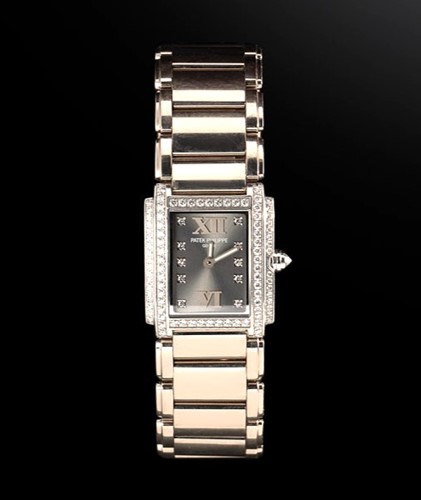 Lot 179 - Patek Philippe - An 18ct white gold 'Twenty-4' diamond set watch