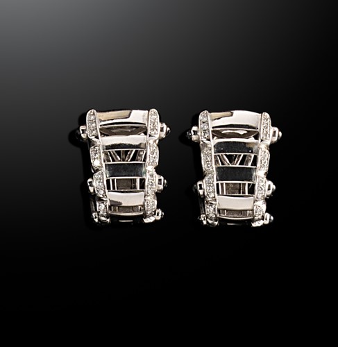 Lot 181 - Patek Philippe - A pair of 18ct gold 'Twenty-4' sapphire and diamond earrings
