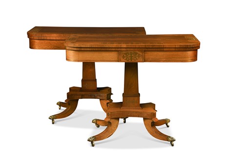 Lot 474 - A pair of Regency rosewood and brass inlaid card tables
