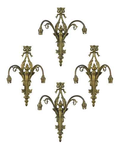 Lot 443 - A set of four Empire style brass wall sconces, early 20th century