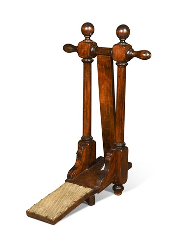 Lot 446 - A stained-beech boot jack, 19th century
