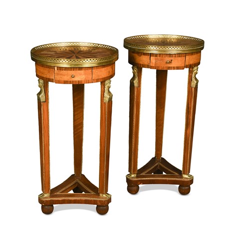Lot 519 - A pair of French Empire style walnut and rosewood parquetry inlaid gueridons