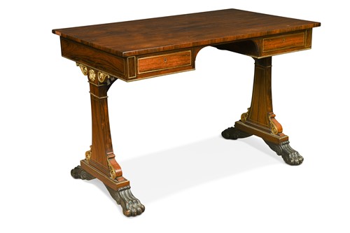 Lot 585 - A Regency rosewood and gilt metal-mounted library table