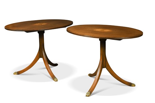 Lot 685 - A pair of Regency-style inlaid mahogany oval-topped tables