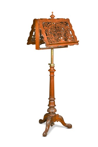 Lot 615 - An early Victorian walnut duet stand