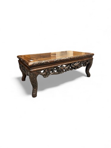 Lot 743 - A Chinese hardwood low table, 20th...