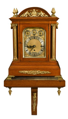 Lot 619 - An oak and gilt-metal mounted chiming bracket clock, circa 1900