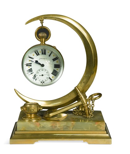 Lot 564 - A brass oversized pocket watch by Godchaux, 20th century