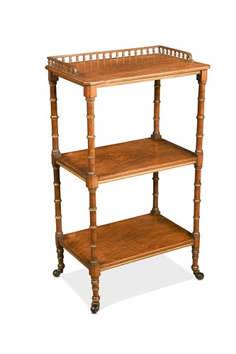 Lot 625 - A figured walnut and parcel-gilt etagere, late 19th century