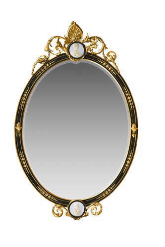 Lot 526 - A Victorian ebonised and parcel-gilt oval wall mirror