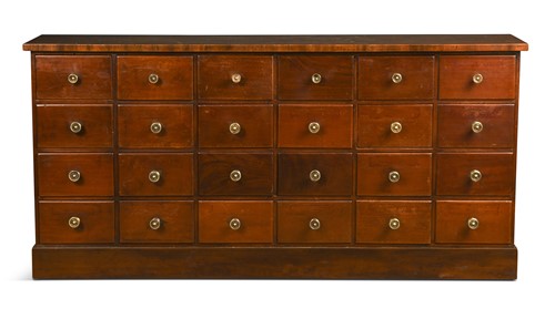 Lot 582 - A mahogany bank of twenty four drawers, 20th century