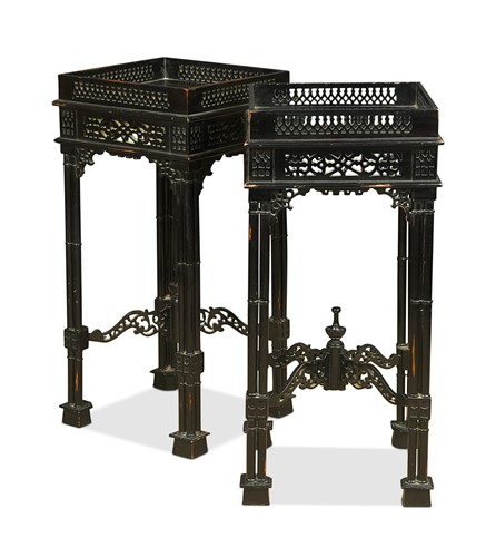 Lot 661 - A pair of George III style ebonised urn stands, 20th century