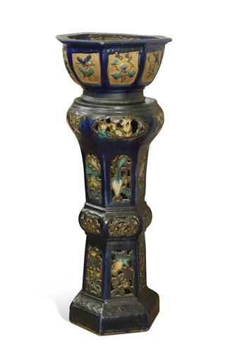 Lot 459 - A Chinese blue glazed earthenware jardiniere on stand, late 19th century