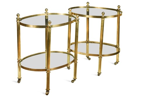 Lot 605 - A pair of brass and glass two tier occasional tables, modern