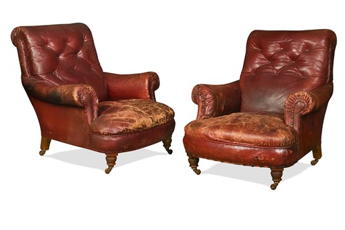 Lot 514 - A pair of Edwardian leather upholstered armchairs