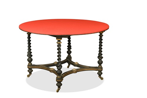 Lot 671 - A Victorian Aesthetic ebonised and parcel gilt circular games table, by Howard & Sons