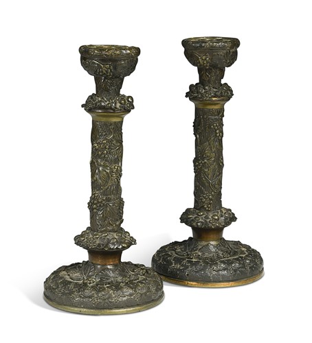 Lot 684 - A pair of patinated bronze candlesticks, 19th century