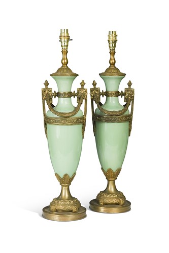 Lot 671 - A pair of celadon-glazed and gilt-metal-mounted vases