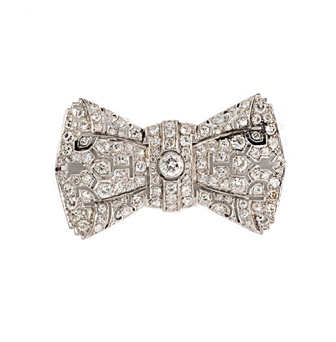 Lot 134 - A mid 20th century diamond set bow brooch