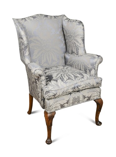 Lot 398 - A small George III-style mahogany wingback armchair
