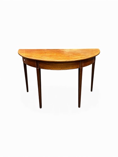 Lot 624 - A George III mahogany D end to a dining table,...