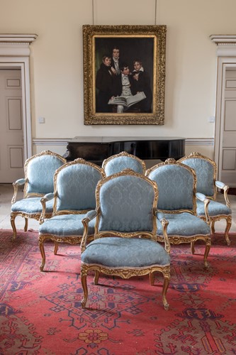 Lot 546 - A suite of six French Louis XV gilt frame armchairs, 18th century