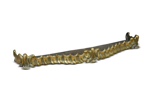 Lot 681 - A French brass fire curb with cherub mounted chenets, 19th century