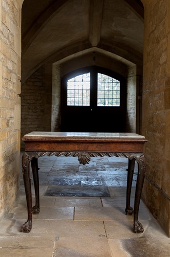 Lot 413 - A walnut side table with inset marble top, probably Irish, mid-18th century