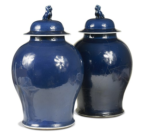 Lot 11 - A pair of Chinese blue glazed porcelain jars and covers, Qing dynasty, circa 1800