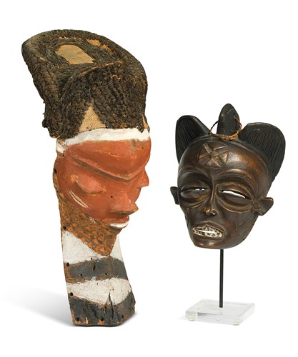 Lot 73 - A Pende (DRC) Baule mask, painted in red and white pigment and with raffia hair
