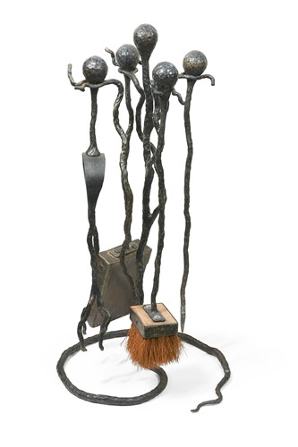 Lot 259 - A wrought iron fireside companion set, in the manner of Diego Giacometti