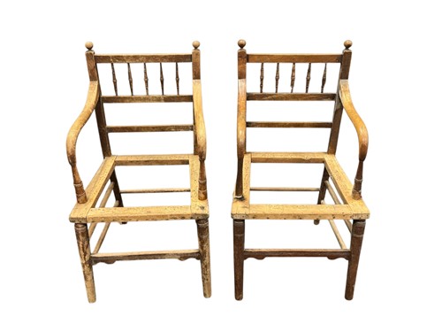 Lot 694 - A near pair of walnut elbow chairs after...