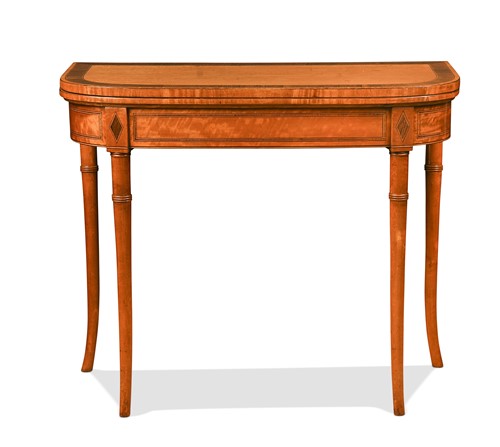 Lot 593 - A Regency satinwood card table with rosewood crossbanding and ebony inlay