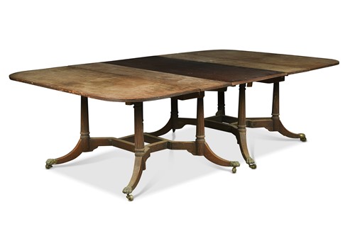 Lot 558 - A Regency mahogany Cumberland action dining table